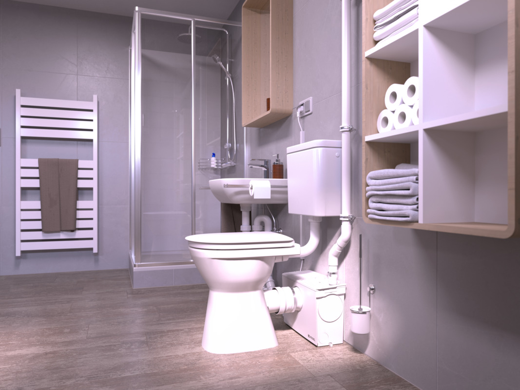 Vedere de ansamblu a sistemului de montare Minilift M WC, a doua perspectivă Prim-plan al unei toalete, în spatele căreia se află o stație de pompare mică, la care este racordată și o duș.