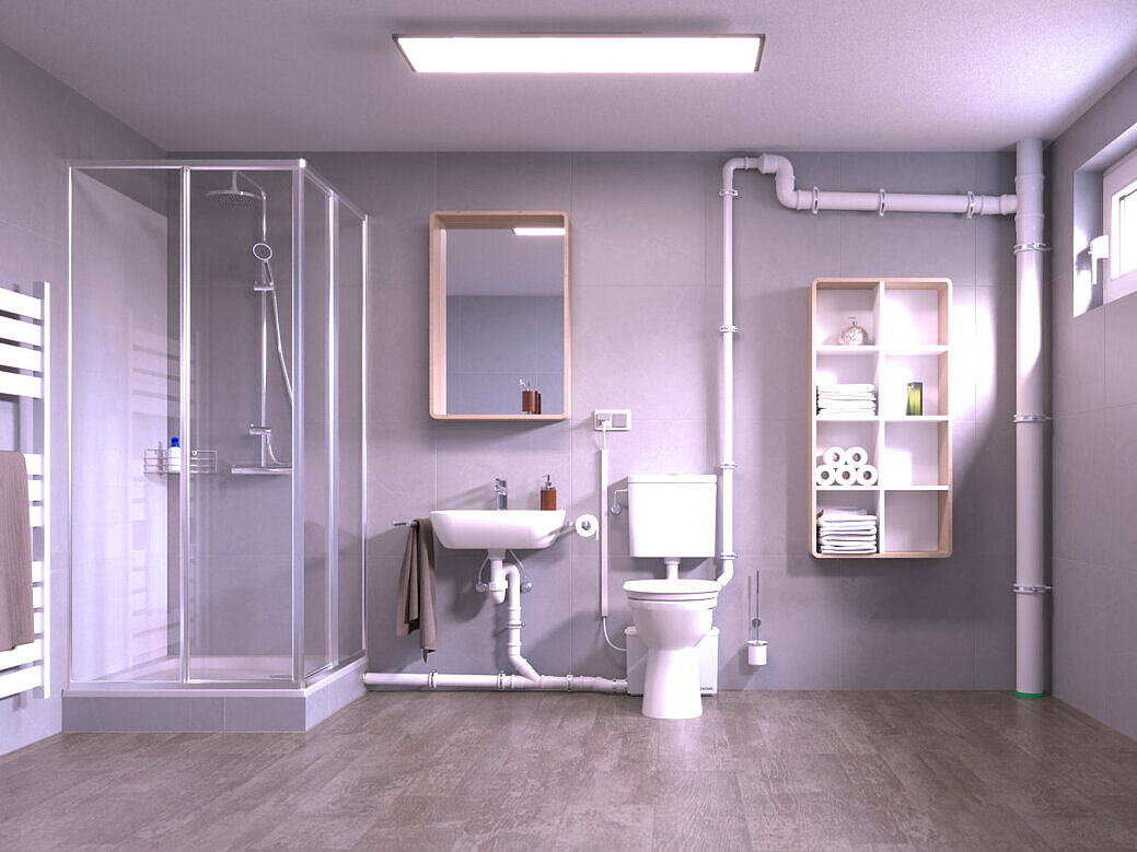 Schema de montare a instalației de ridicare de mici dimensiuni Minilift M WC Podea cu toaletă și duș instalate ulterior, care sunt drenate printr-o mică stație de pompare amplasată în spatele toaletei.