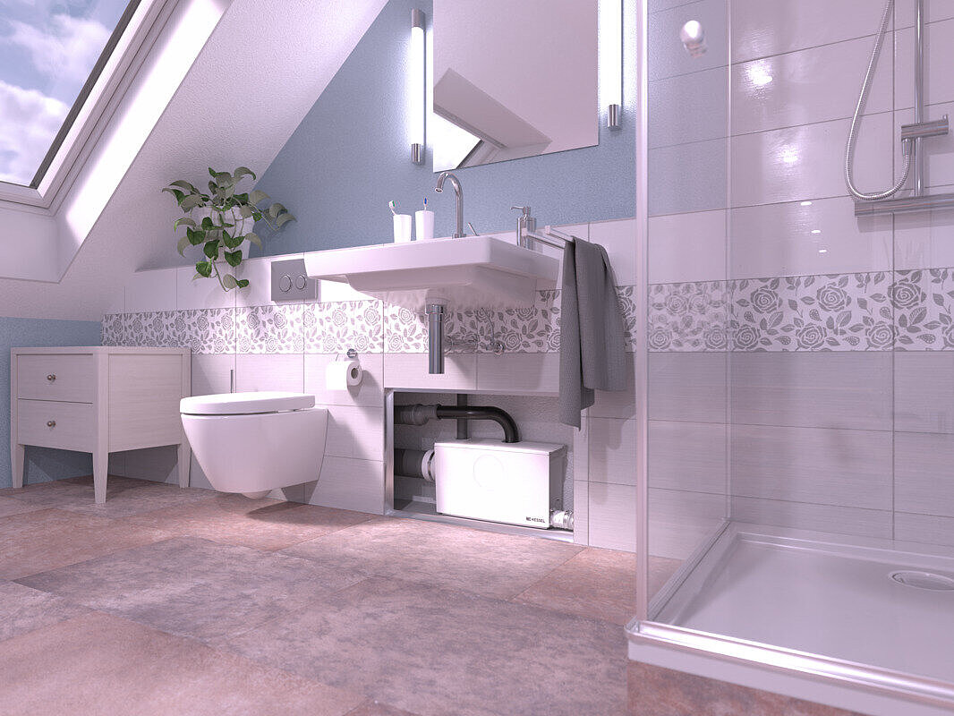 Reprezentare a montării toaletei Minilift L – a doua perspectivă Imagine detaliată a instalației de ridicare de mici dimensiuni Minilift L WC într-o instalație montată în fața peretelui, cu toaletă și duș racordate